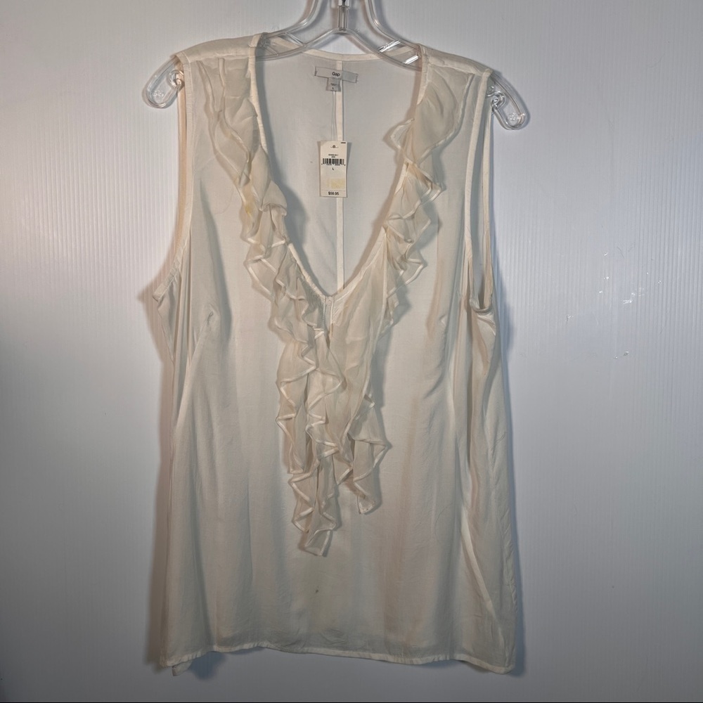 GAP Ruffle Top. 100% Viscose. Size Large. Sleeveless. Small ink spot